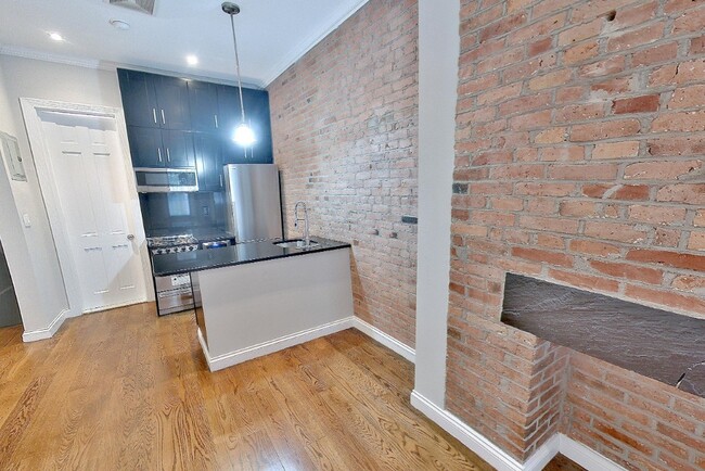 Photo - 279 E 10th St Apartment