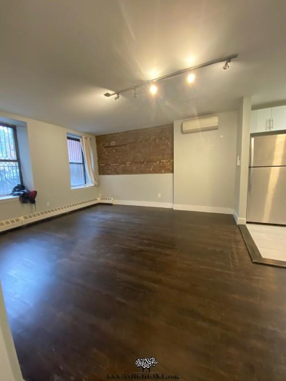 Foto del edificio - 3 E 124th St