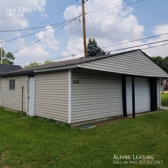 Building Photo - West Indy 3BR House w/Garage!