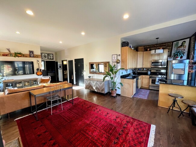 Main living space; room for additional dining table - 2301 W North Ave