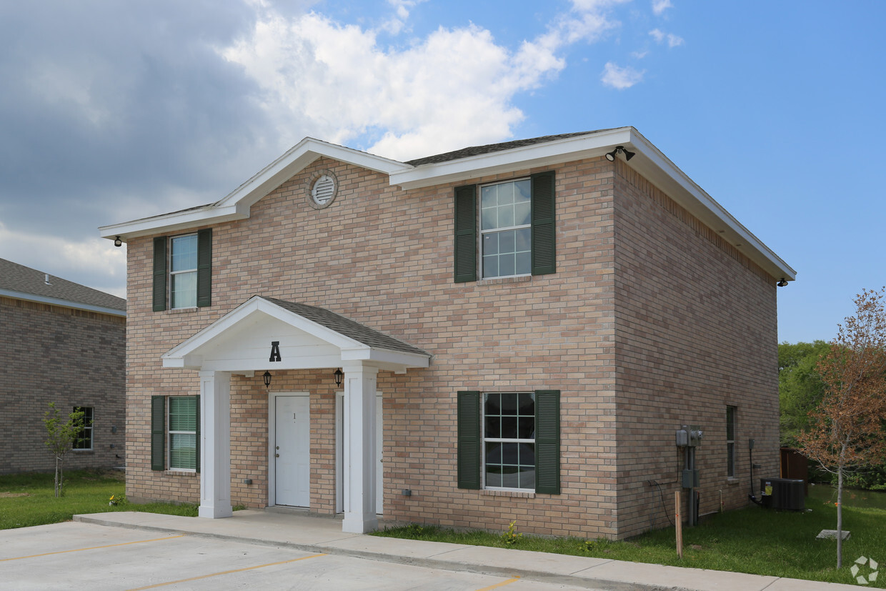 Frente - Midtown Duplexes