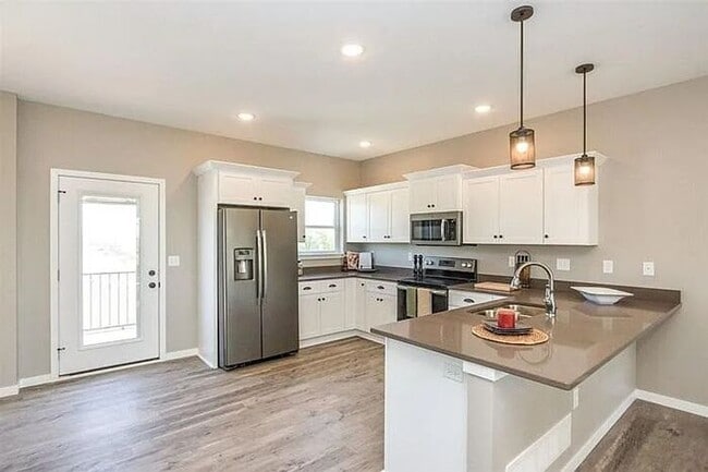 Photo - $2,400 | 3 Bedroom, 2.5 Bathroom Town Home | Pet Friendly | Available for an August 1st, 2026 Mov...