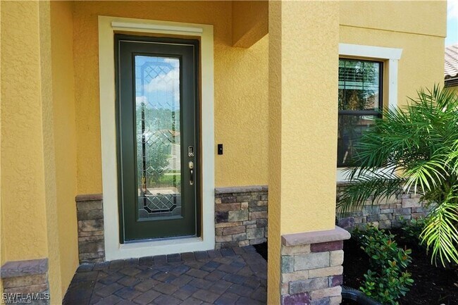 Building Photo - 4232 Raffia Palm Cir