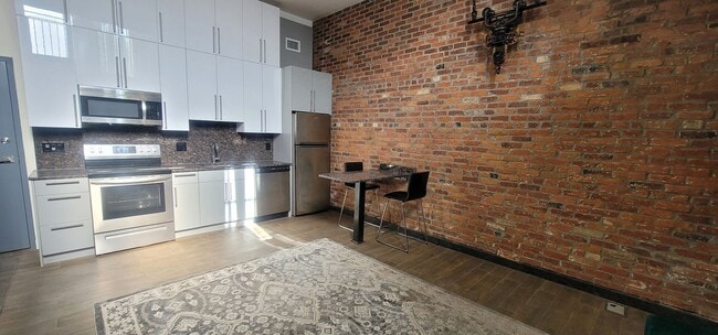Building Photo - GORGEOUS, UNIQUE, LUXURY GEM right by BU C...