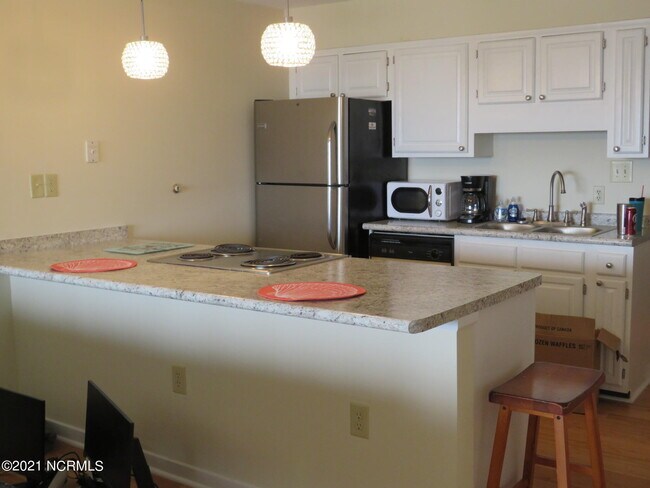 Foto del edificio - 9100 Reed Dr