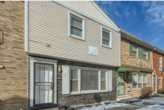 Building Photo - 7246 S Coles Ave