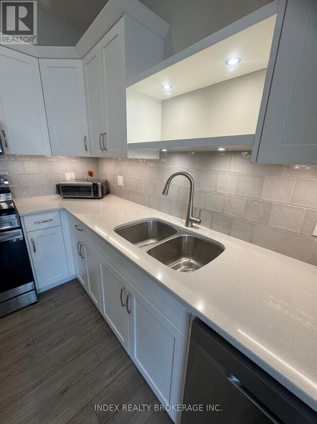 Photo du bâtiment - 30 Keba Cres