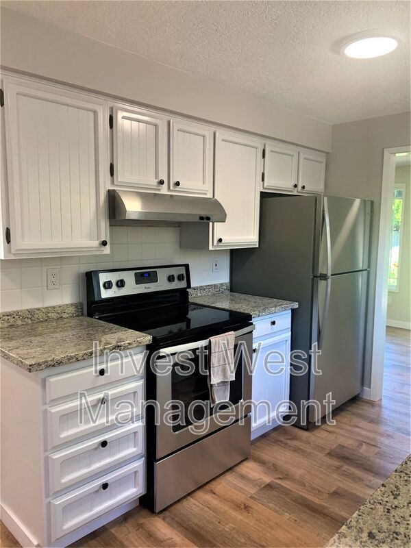 Foto del edificio - 12214 SE McGillivray Blvd