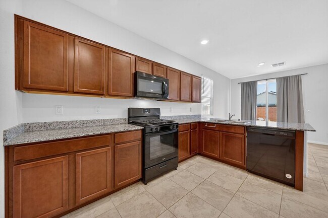 Foto del edificio - 6482 Blue Ember Ave