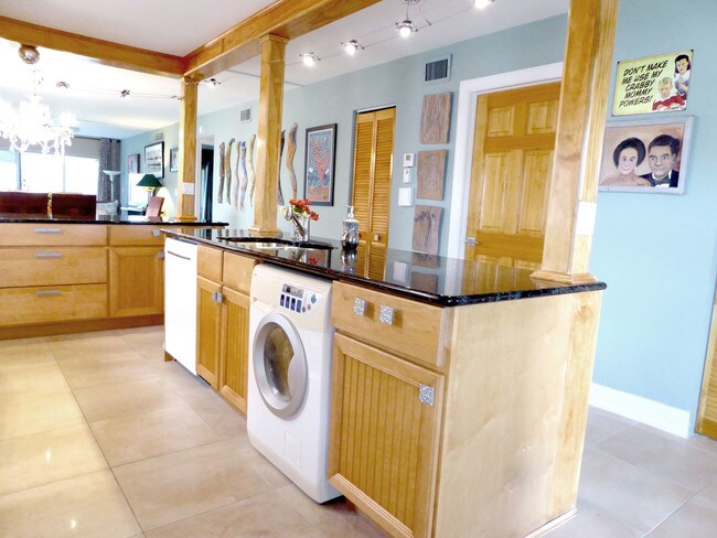 Full appliances including washer/dryer combo - 13342 Pineapple Palm Ct