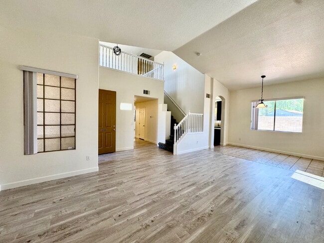 Building Photo - Spacious 4BD/3BA NLV Home with Downstairs ...