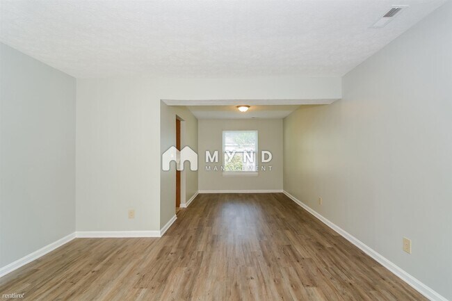 Building Photo - 4 br, 2.5 bath House - 7925 Mcguire Dr