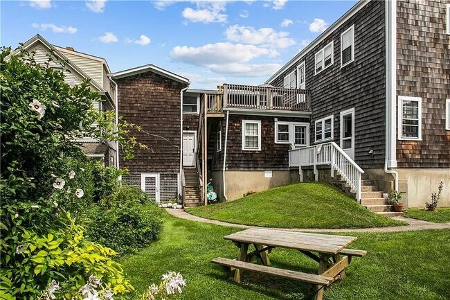 back view of house with yard - 36 Kay St