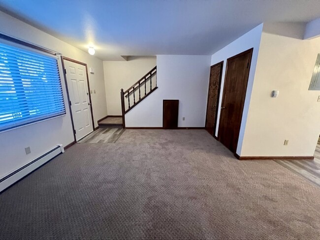 Building Photo - "Cozy 2-Bed Condo with Fireplace Oasis in ...