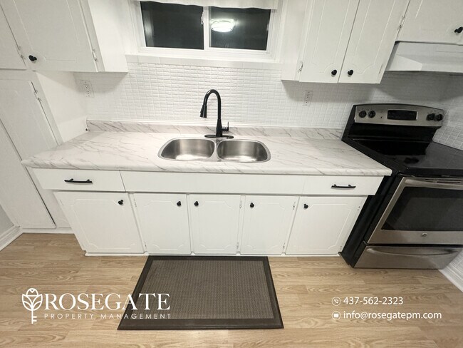 Photo du bâtiment - All-Inclusive 1-Bedroom Basement Apartment with Parking in Mississauga