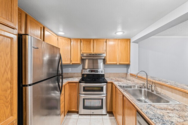 Kitchen with Refrigerator, Stove, Dishwaher - 130 SW 116th St