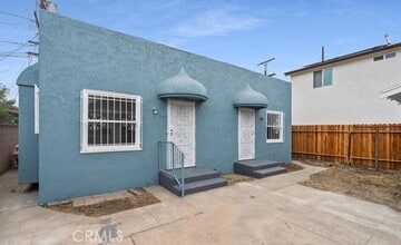 Building Photo - 454 W 59th Pl