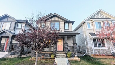 Building Photo - 16008-16013 13 Ave SW