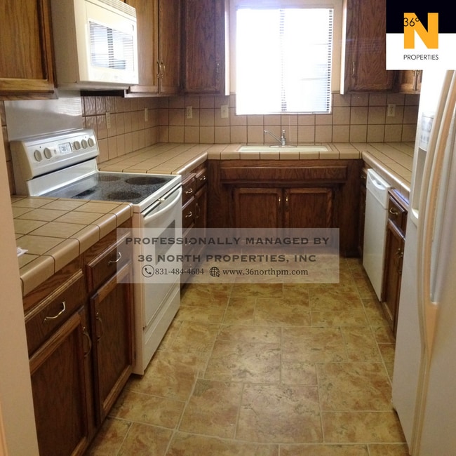 Building Photo - Welcoming Condo in Gated Community