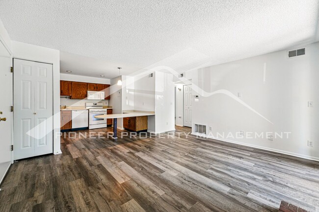 Building Photo - Charming Condo with Washer/Dryer and Patio