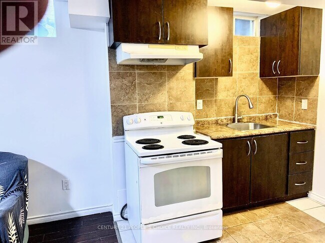 Photo du bâtiment - 40 Palm Tree Rd