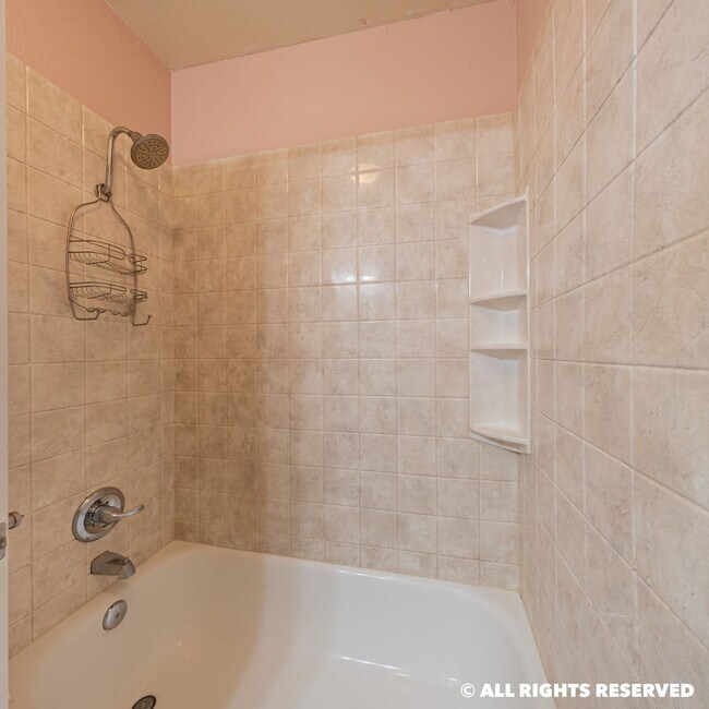 Building Photo - top floor 1 bed 1 bath condo. In unit laundry