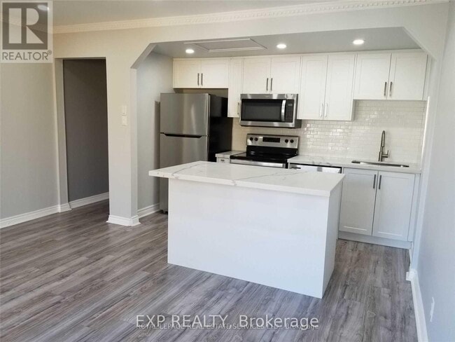 Photo du bâtiment - 33 Mitchell Ave