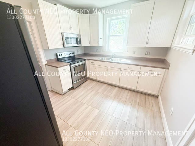 Building Photo - 9474 Roxbury Rd