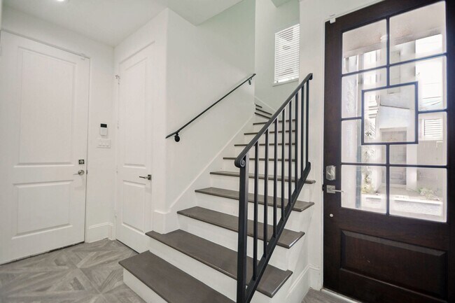 Building Photo - New construction, 4 story home with 3 beds...