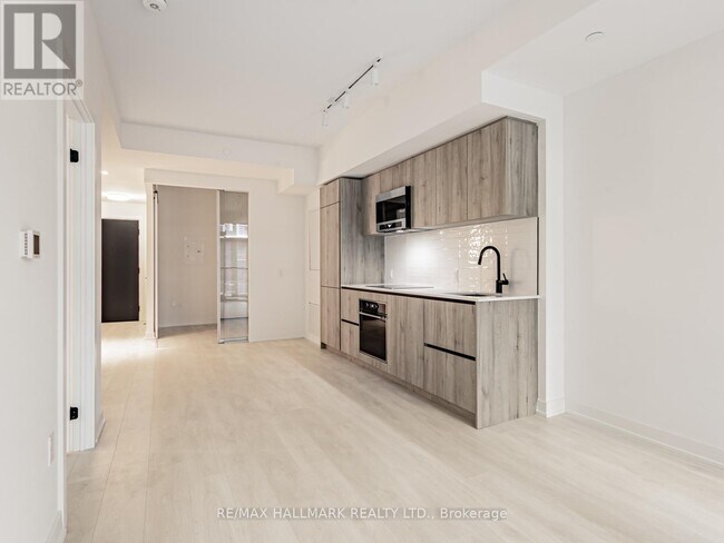 Photo du bâtiment - 117-2117 Broadway Ave