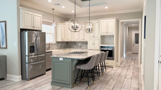Building Photo - A Modern 3BR Home: Stylish, Patio with Com...