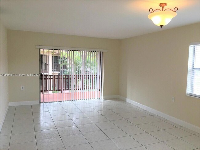 Building Photo - 11207 SW 88TH St Unit 214A