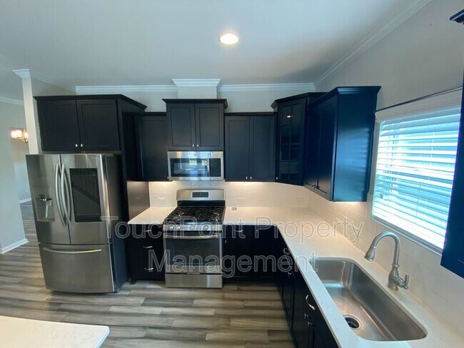 Building Photo - 5839 Eleanor Rigby Rd