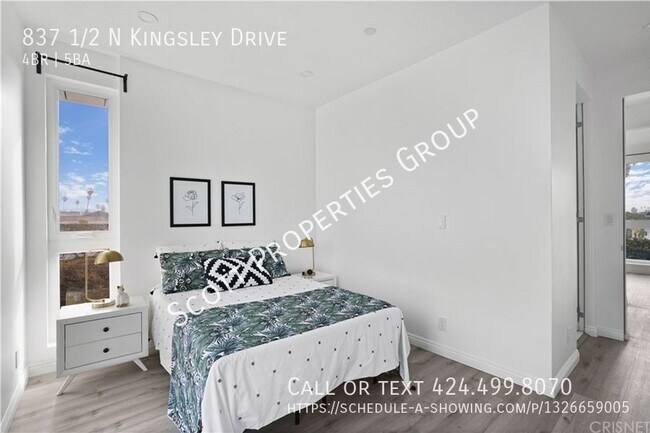 Building Photo - Modern 2-Story Townhouse: 4 Bedrooms + 4.5...