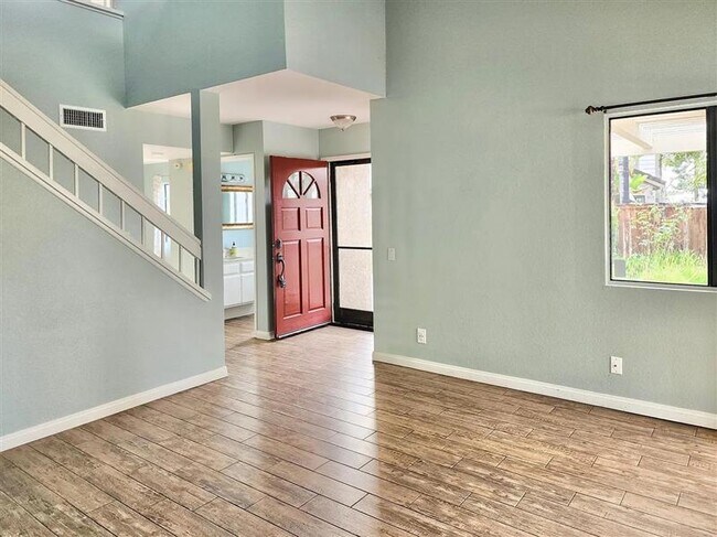 Building Photo - Welcome to an immaculate attached single f...