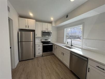 Foto del edificio - "Charming 3-Bed Retreat in Minneapolis: 850 Sq Ft of Cozy Living!"