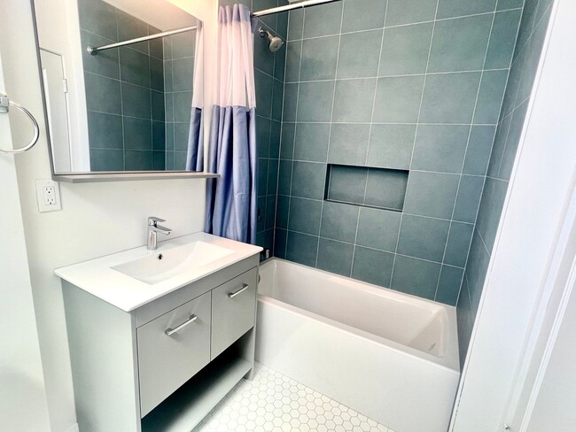 Building Photo - Fully Renovated Bright Corner Apartment wi...