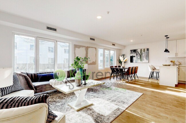 Building Photo - Brand New End-Unit 3-Bedroom Townhome with Garage, Driveway & EV Charger – First Occupancy!