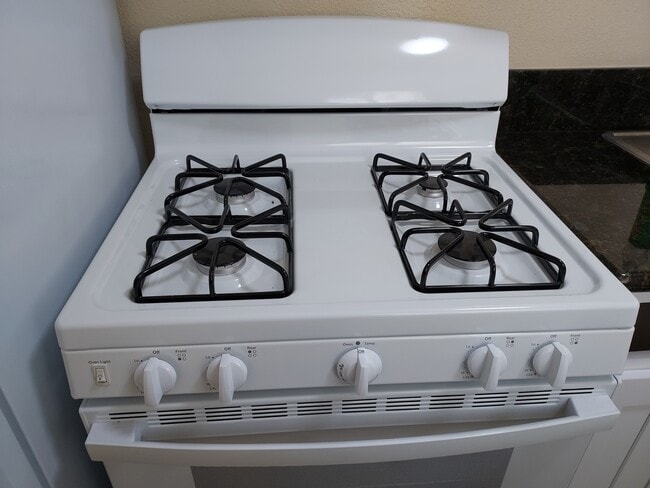 new stove - 6043 Romaine St - Off Market