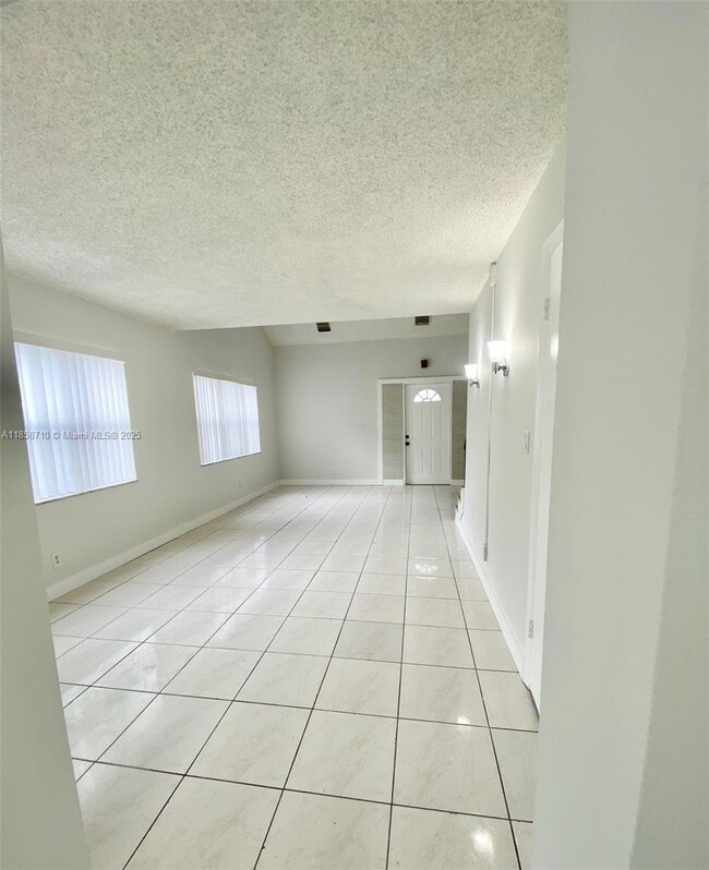 Building Photo - 3200 Coral Springs Dr