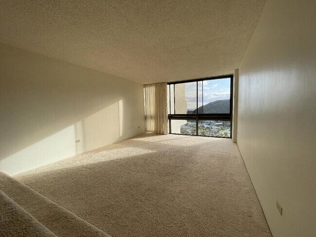Building Photo - MAUNA LUAN 1/1/2 hi flr, sec, W/D, A/C, st...