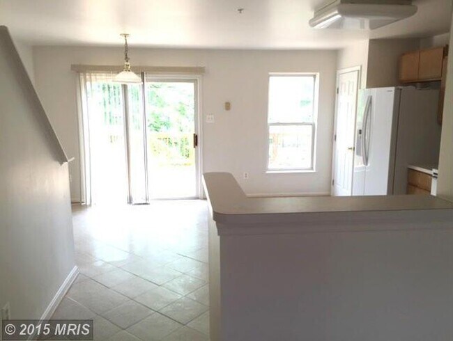 Building Photo - A spacious three bedroom, two and one half...