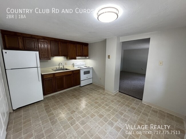 Building Photo - 671 Country Club Rd