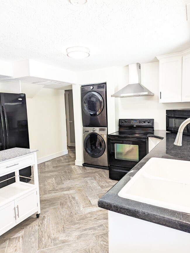 Kitchen with laundry - 125 S Fremont Way