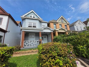 Building Photo - 703 E 14th Ave