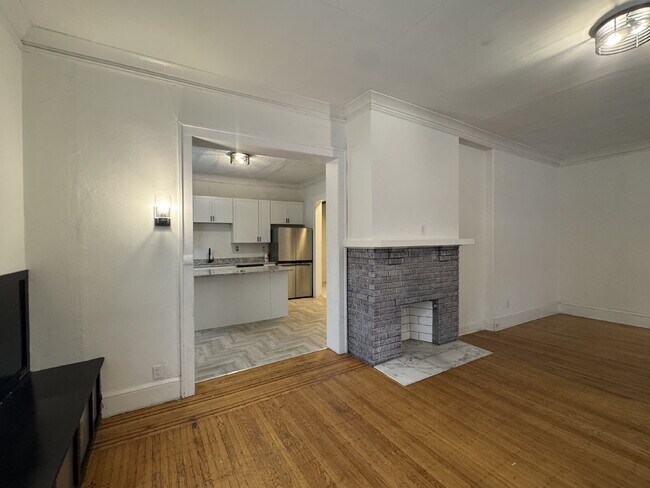 Building Photo - "Spacious 3-Bedroom Minneapolis Gem with Gleaming Hardwood Floors & 2 Full Baths!"