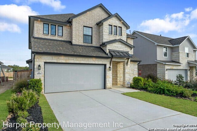 Building Photo - 4 br, 3.5 bath House - 13011 Blue Flame Dr