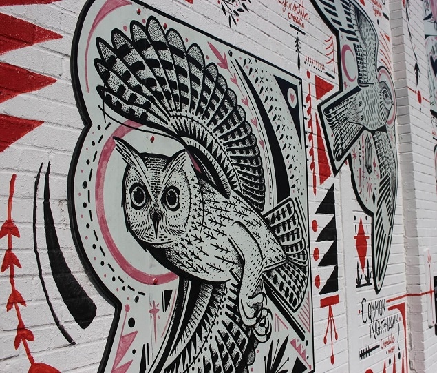 A lively mural painted during AthFest, a popular art and music festival