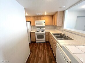 Building Photo - 1830 N Pecos Rd