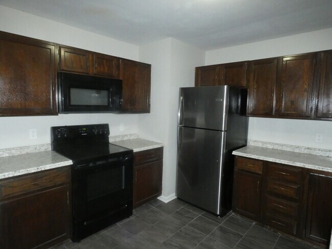 Foto del edificio - Northland Home 3924 N Denver Ave
